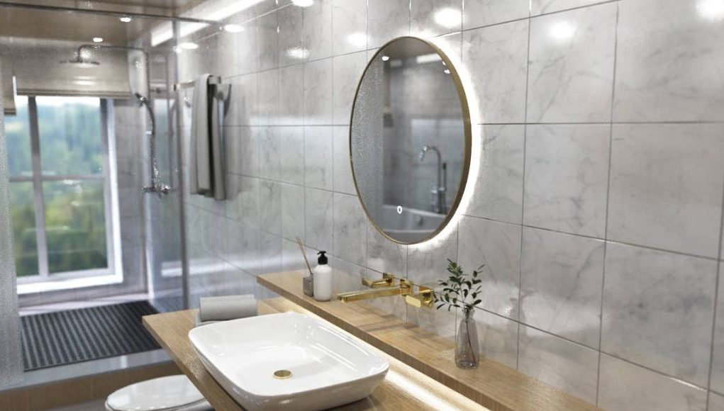 Bright bathroom with a lit round LED mirror