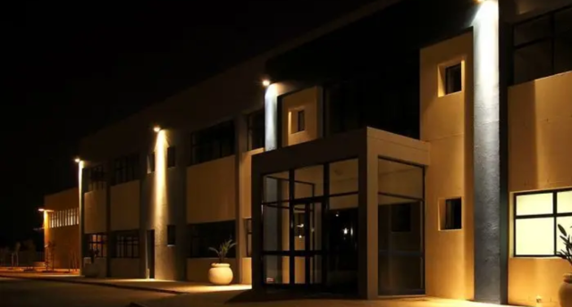 modern home brightened by LED flood lights