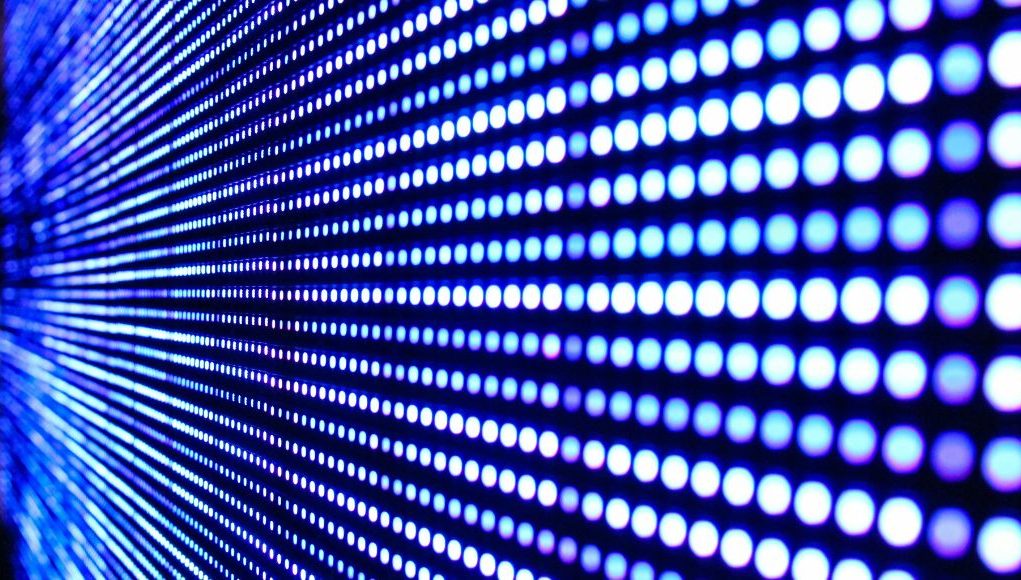 Close-up image of an LED screen, showing rows of circle lights