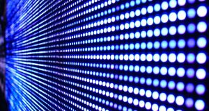 Close-up image of an LED screen, showing rows of circle lights
