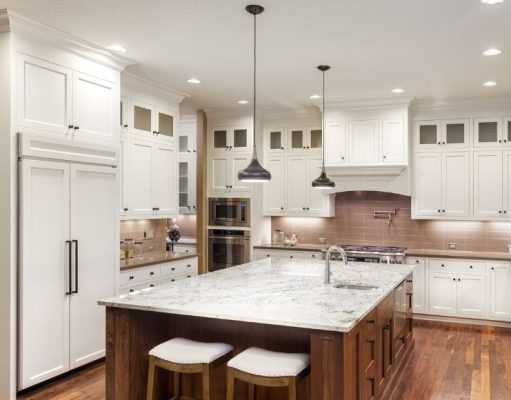 Dining room with a centre island and different lights installed