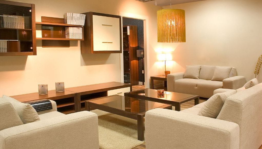 furnished living room with warm white light fixtures