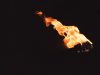 Black background with an image of a torch