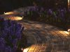 spike lights at the edge of the pavers