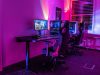 PC gaming setup with red and blue lights.
