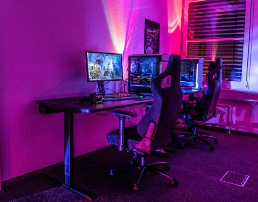 PC gaming setup with red and blue lights.