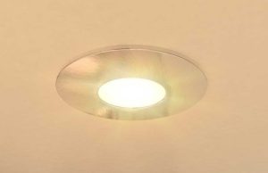 Single downlight in bathroom ceiling