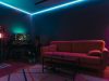 A gaming room with LED neon strip lights.