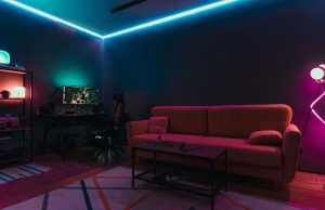 A gaming room with LED neon strip lights.