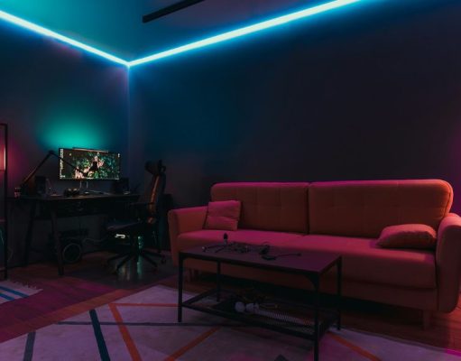 A gaming room with LED neon strip lights.