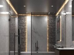 bathroom illuminated by LED strips and downlights