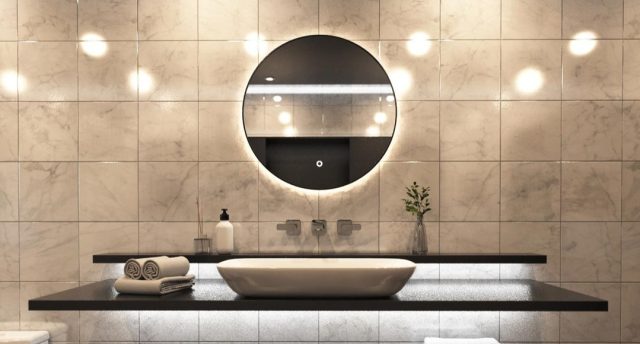Bathroom vanity area with smart LED mirror