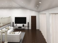 A living room with a low ceiling.