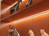 LED Strip Controllers & Drivers: Everything You Need to Know Wooden shelves with different animal figurines and installed strip lights.