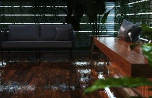 An outdoor deck that's wet from rain with multiple strip lighting on the perimeter wall.