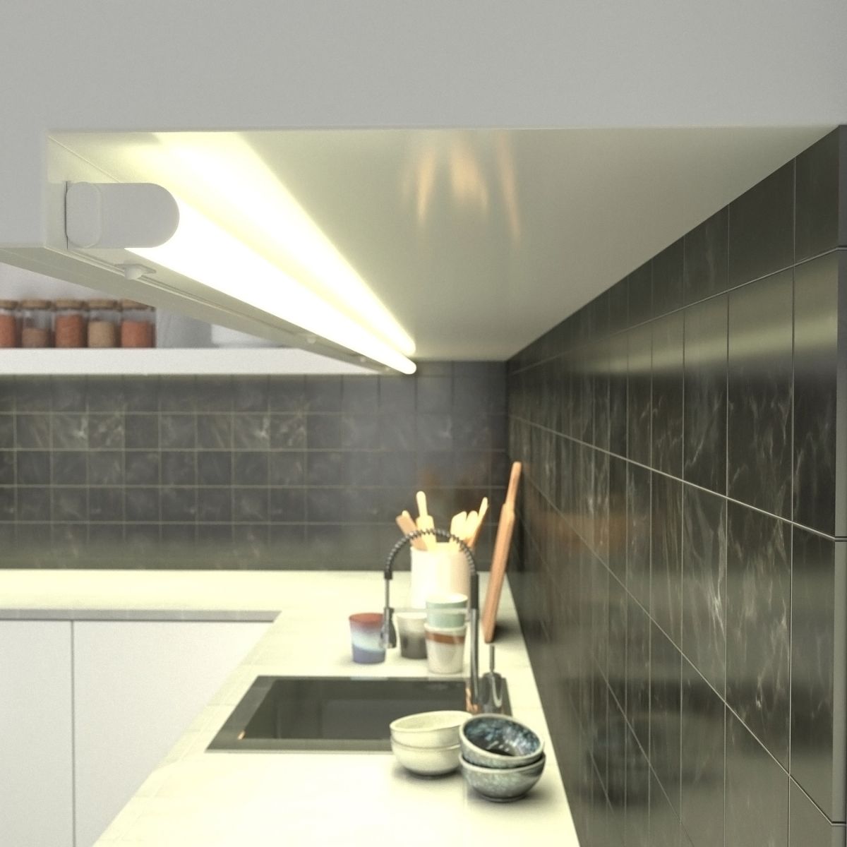 Countertop with sink illuminated by a warm LED linear light.