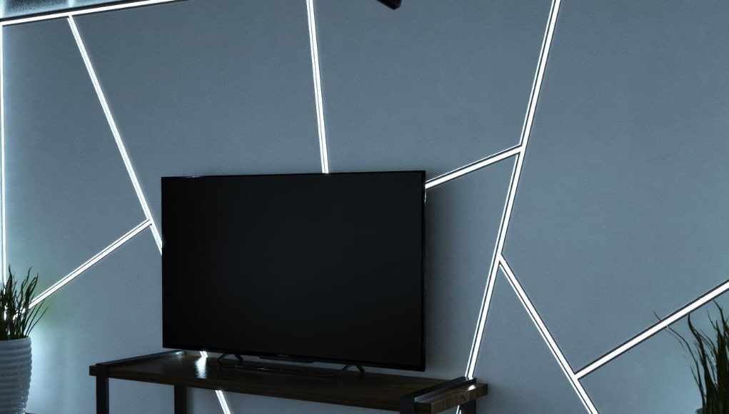 LED Profile 1 A living room TV with a feature wall with multiple LED strip lights installed in aluminium profiles.