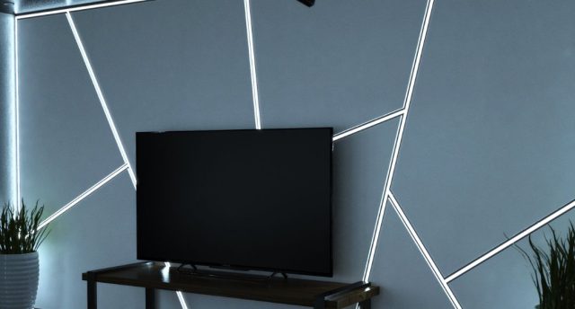 A living room TV with a feature wall with multiple LED strip lights installed in aluminium profiles.
