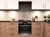 Small Kitchen Lighting Ideas to Maximise Space A modern kitchen with wooden cabinets and wall cabinets with lights.