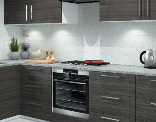The Best Under-Cabinet Lighting for Kitchens A modern kitchen with dark wood cabinets and white splashback.