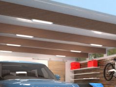 How to Choose the Best LED Batten Lights for Garages A garage ceiling with multiple batten lights installed on the exposed beams.