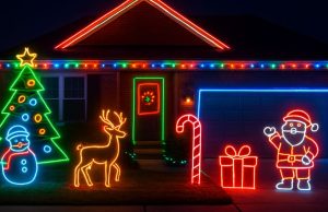 An outdoor Christmas decoration of a home using LED neon lights.