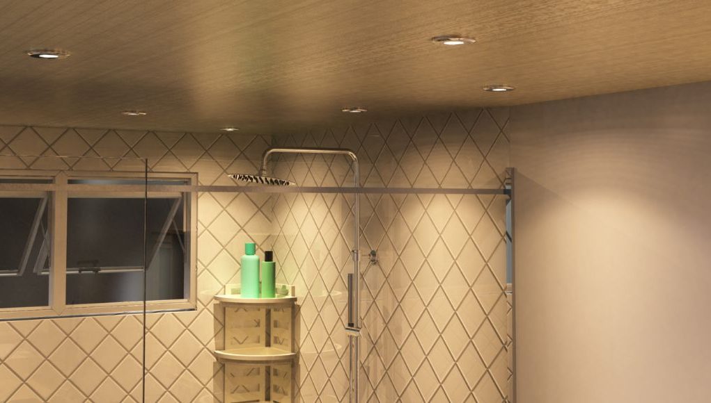 A modern bathroom lit by warm downlights.