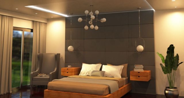 Bedroom Lighting Ideas for Comfort and Style A modern bedroom washed in warm lighting from recessed ceiling lights and strip lights, a statement pendant light is hanging in the middle.