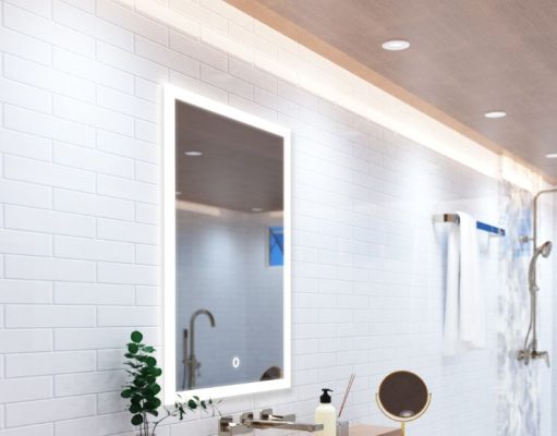 A bright modern bathroom with an LED bathroom mirror, strip lights lining the ceiling, and multiple LED downlights.