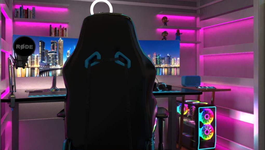 Gaming & Entertainment Room Lighting Ideas Hero Image A PC gaming setup with pink strip lights lining the walls and shelves.