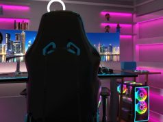 Gaming & Entertainment Room Lighting Ideas for Immersion A PC gaming setup with pink strip lights lining the walls and shelves.