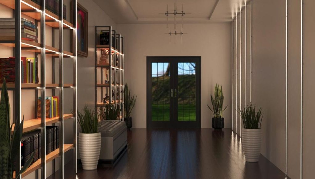 Hallway & Landing Lighting Ideas Hero Image A hallway with illuminated shelving to the left side and an unlit statement pendant in the middle of the ceiling.