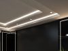 How to Create a Modern Living Room with Recessed Lighting and LED Features A living room ceiling with LED downlights and LED strip lights installed for illumination.