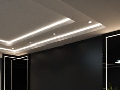 How to Create a Modern Living Room with Recessed Lighting and LED Features A living room ceiling with LED downlights and LED strip lights installed for illumination.