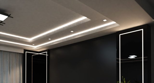 A living room ceiling with LED downlights and LED strip lights installed for illumination.