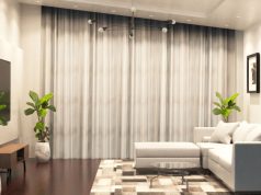 Living Room Lighting Ideas to Set the Perfect Mood A white-themed living room brightly lit by multiple LED downlights.