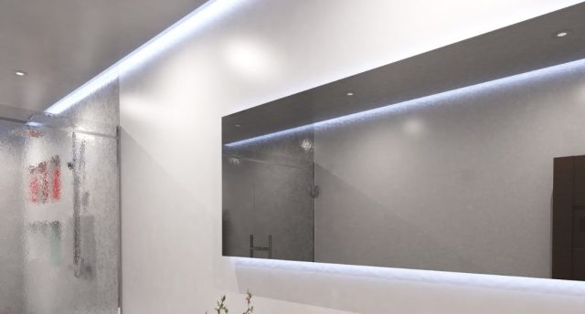 A bright modern bathroom with a large horizontal mirror and ceiling strip lighting.