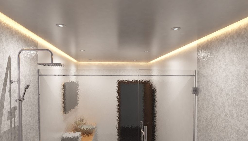 A modern bathroom with warm LED strip lights installed on the ceiling perimeter, along with some downlights evenly spaced throughout.