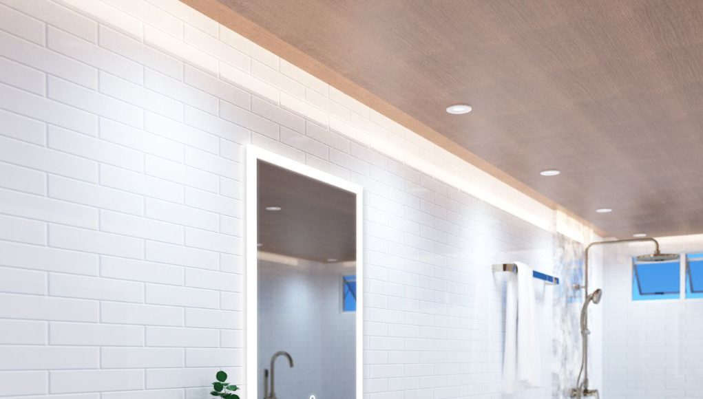 A bright bathroom with a wooden ceiling installed with LED downlights and warm LED strips around the perimeter.