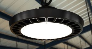 A high bay light with a warehouse background.