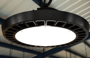 A high bay light with a warehouse background.