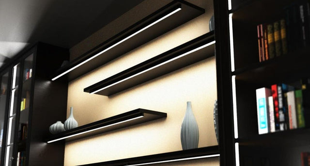 Dark shelves with lines of light underneath each one.