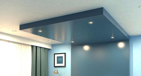 Multiple LED downlights installed on a blue ceiling.