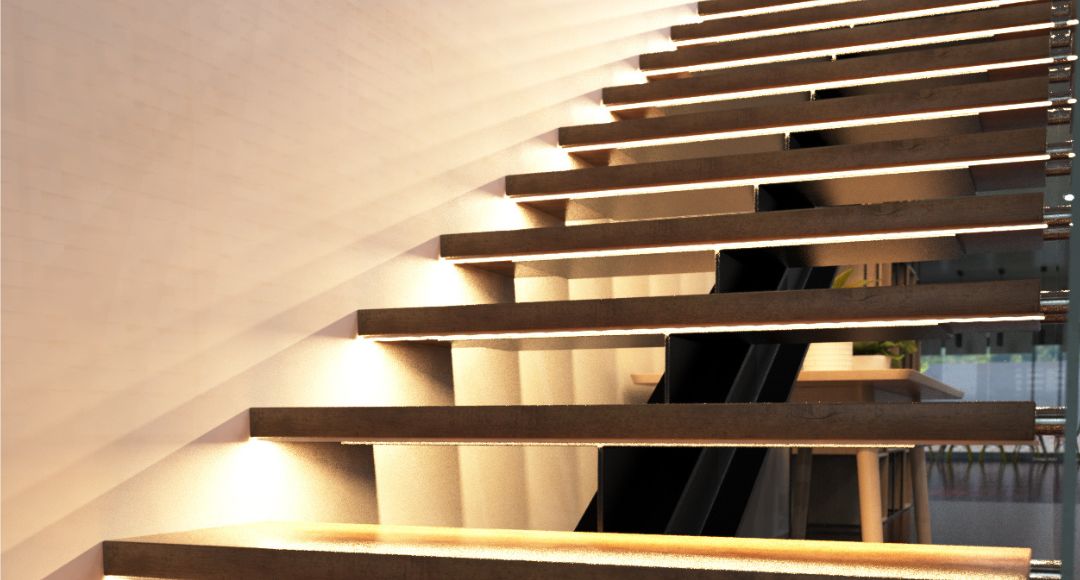 A close up of staircase steps illuminated by warm white LED strips.