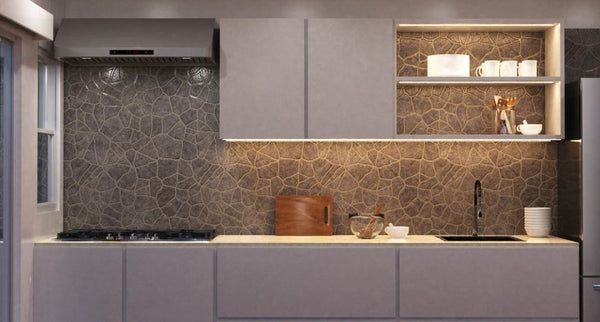 Modern kitchen hob and worktop with warm LED strip lighting under the cabinet and inside shelves.