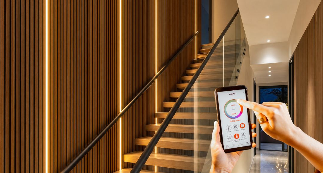 stairs with a hand holding a smart phone