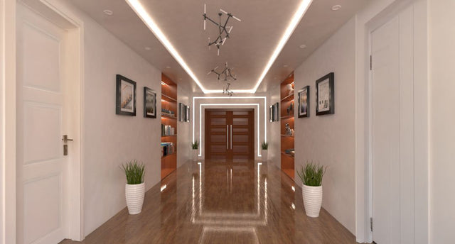 A hallway illuminated by strip lights