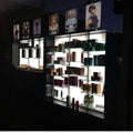 SIde shot of a display cabinet with an illuminated back 