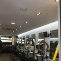 Full shot of a salon with LED tapes in the left side frosted glass