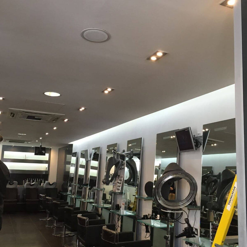 Full shot of a salon with LED tapes in the left side frosted glass